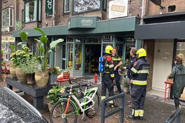 Boeket met kunstbloemen in de brand in bloemenwinkel IJmuiden